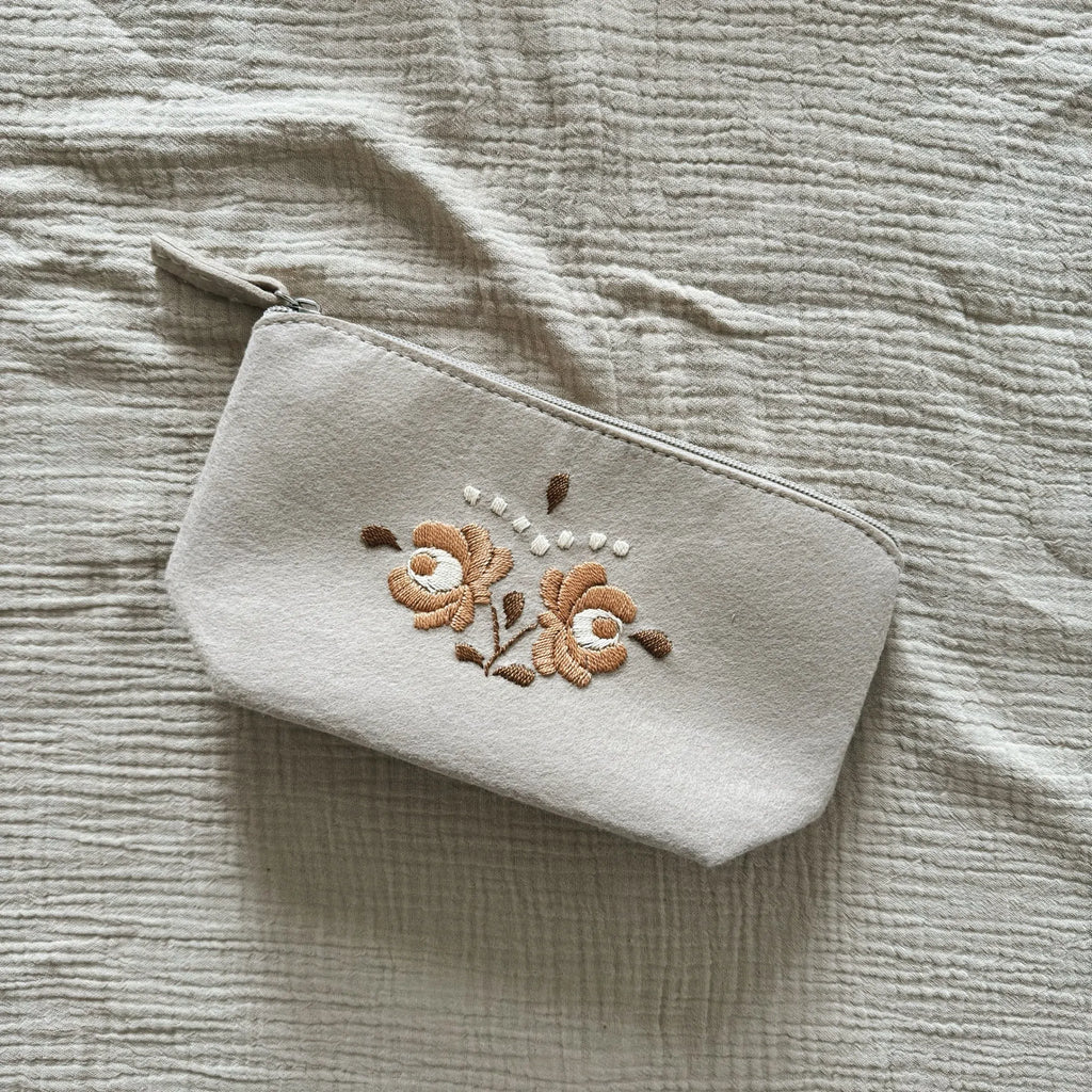 Hand-embroidered toiletry bag