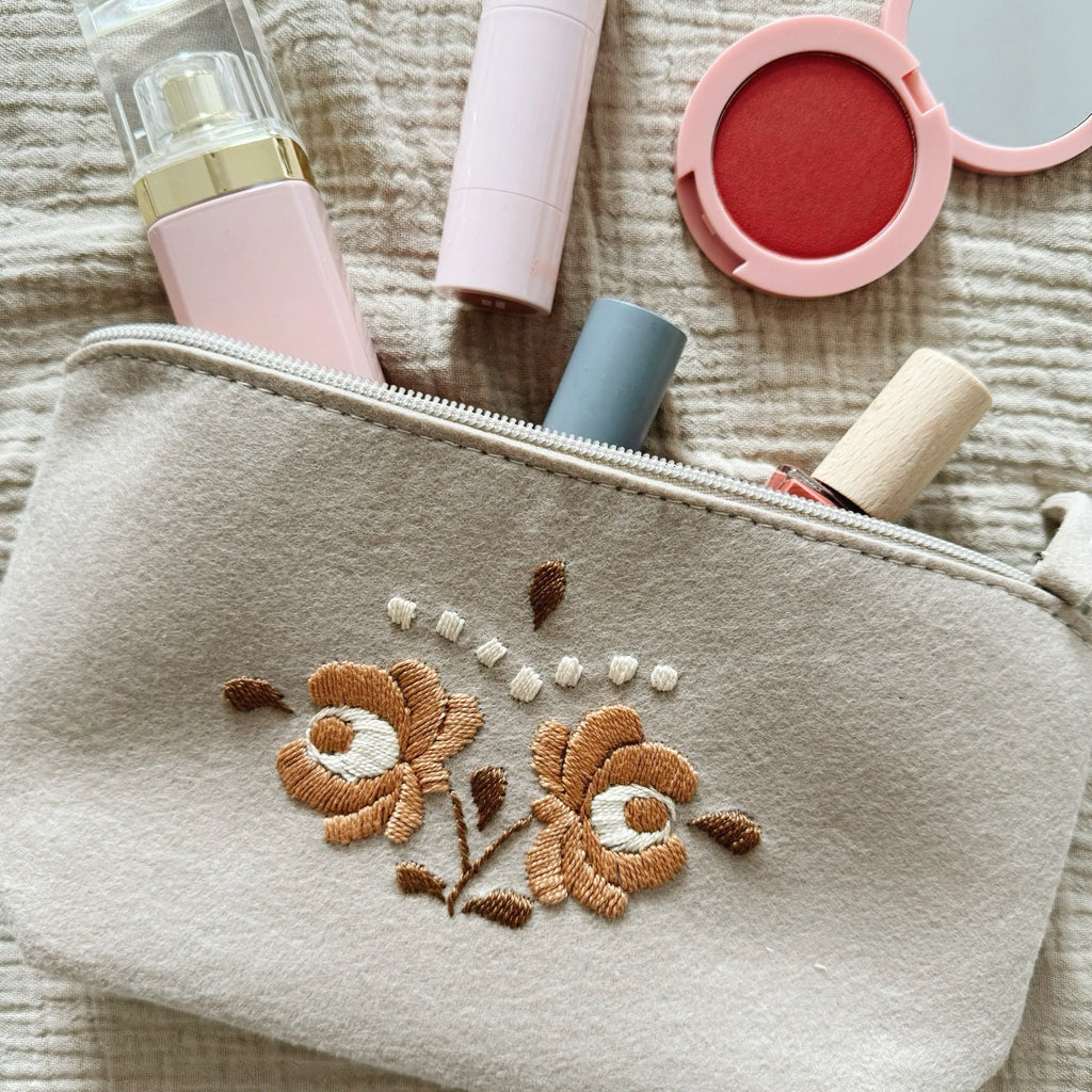 Hand-embroidered toiletry bag